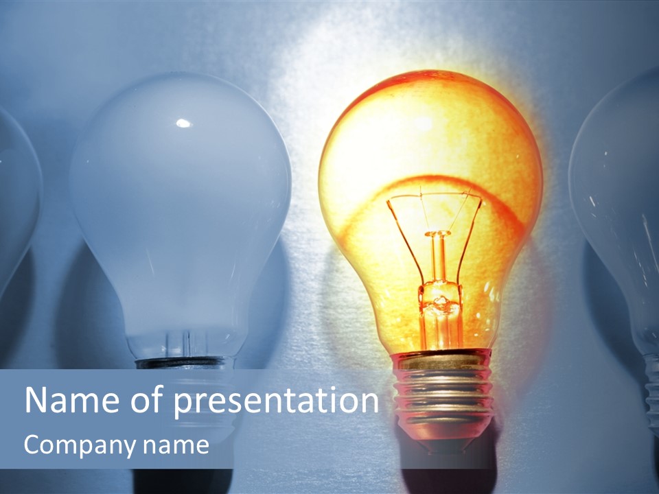 A Group Of Light Bulbs Sitting On Top Of A Table PowerPoint Template