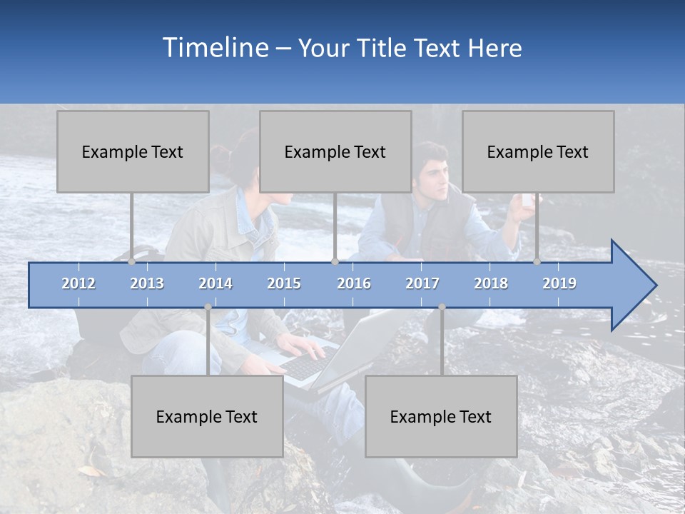 A Man And A Woman Sitting On Rocks With A Laptop PowerPoint Template