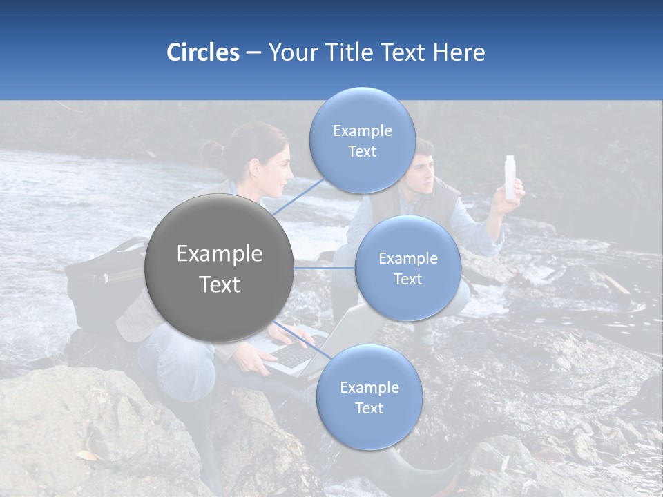 A Man And A Woman Sitting On Rocks With A Laptop PowerPoint Template