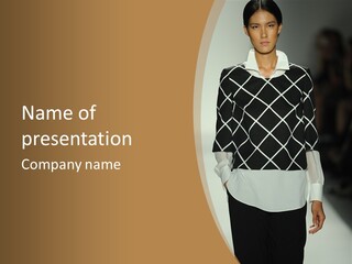 A Woman In A Black And White Sweater On A Runway PowerPoint Template