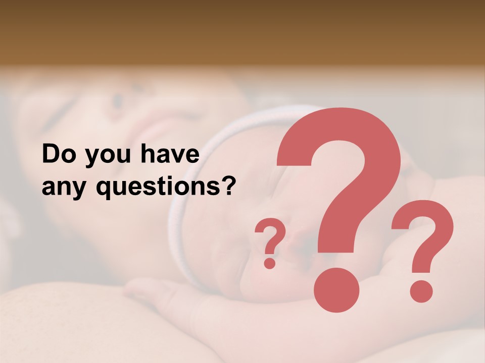 A Woman Holding A Sleeping Baby In Her Arms PowerPoint Template