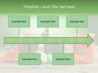 A Table Topped With Glasses Of Juice And Vegetables PowerPoint Template