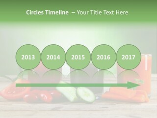 A Table Topped With Glasses Of Juice And Vegetables PowerPoint Template