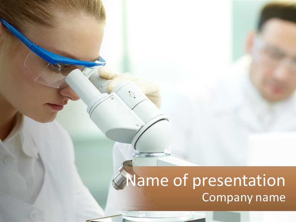 A Woman Looking Through A Microscope With A Man In The Background PowerPoint Template