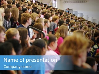 A Large Group Of People In A Building PowerPoint Template