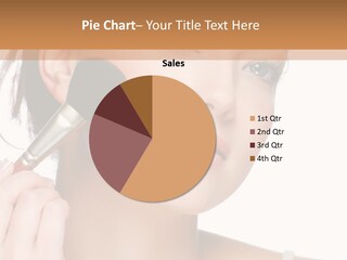 A Woman Holding A Makeup Brush In Front Of Her Face PowerPoint Template