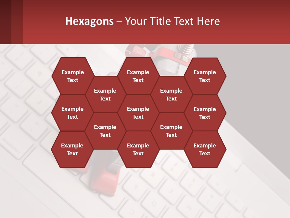 A Robot Keychain Sitting On Top Of A Keyboard PowerPoint Template