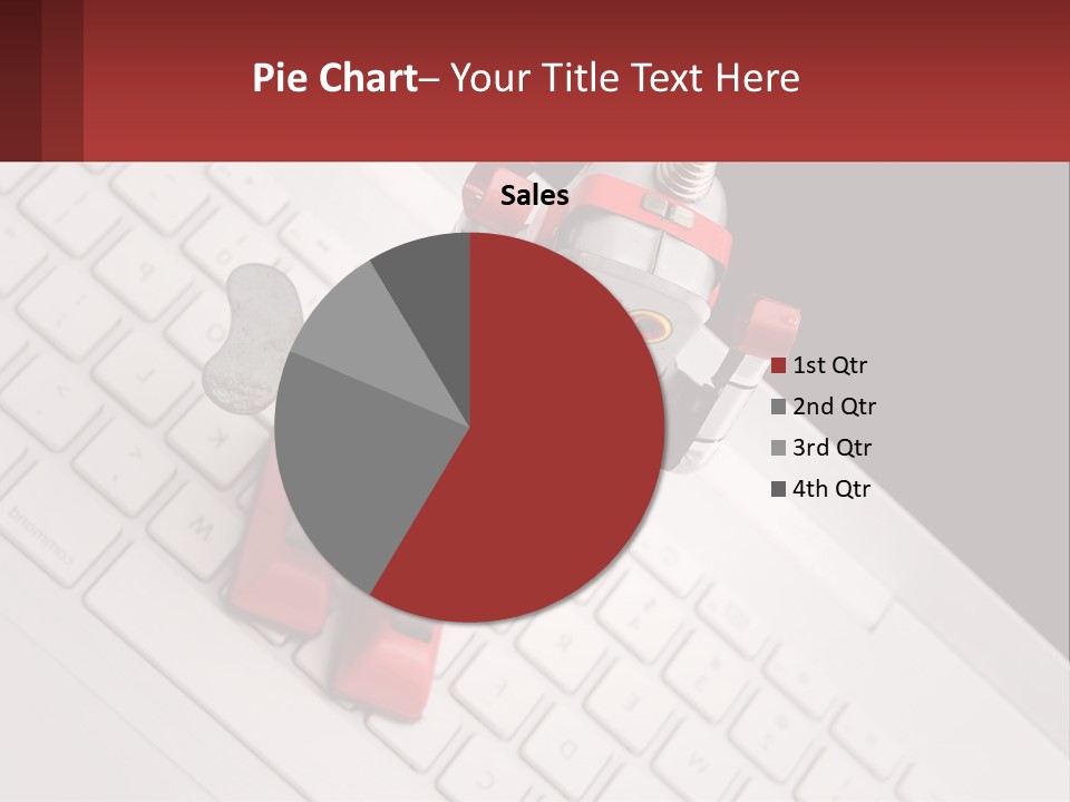 A Robot Keychain Sitting On Top Of A Keyboard PowerPoint Template