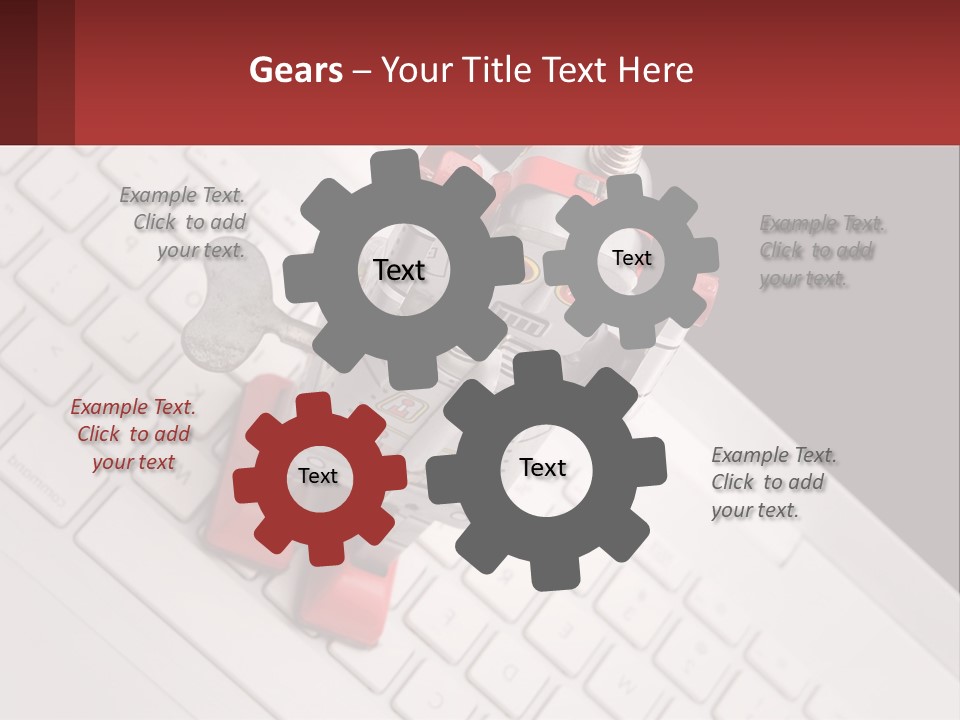 A Robot Keychain Sitting On Top Of A Keyboard PowerPoint Template