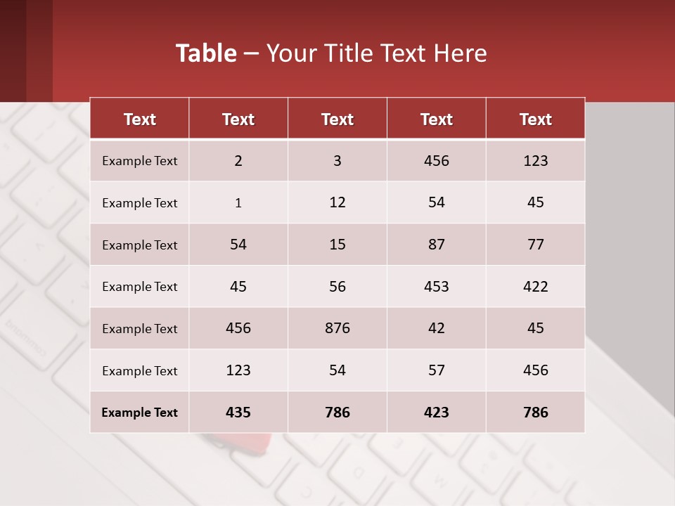 A Robot Keychain Sitting On Top Of A Keyboard PowerPoint Template