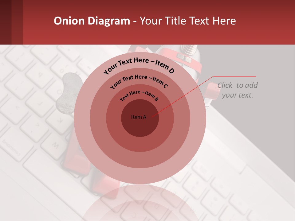 A Robot Keychain Sitting On Top Of A Keyboard PowerPoint Template