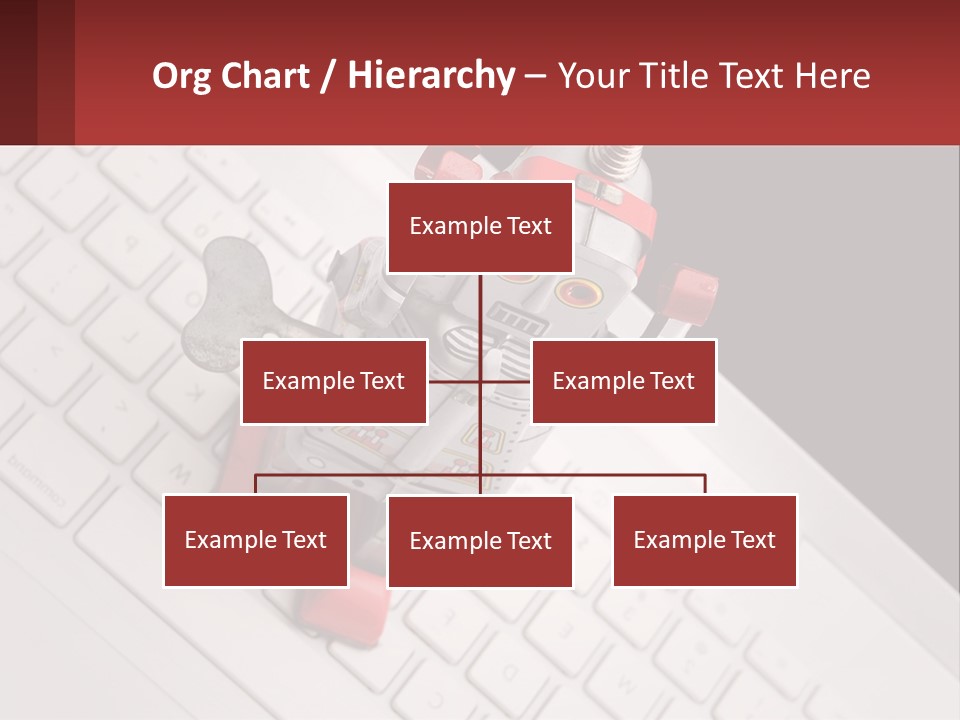 A Robot Keychain Sitting On Top Of A Keyboard PowerPoint Template