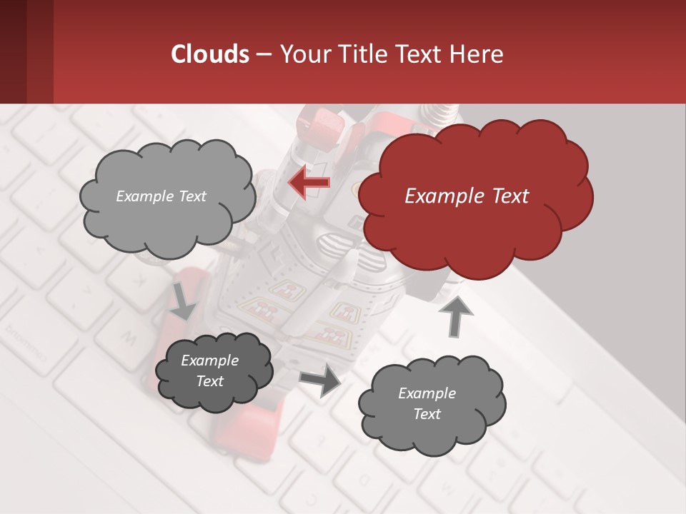 A Robot Keychain Sitting On Top Of A Keyboard PowerPoint Template