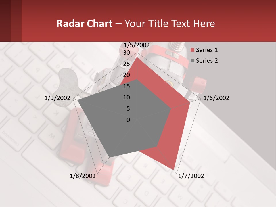 A Robot Keychain Sitting On Top Of A Keyboard PowerPoint Template