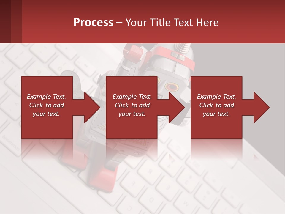 A Robot Keychain Sitting On Top Of A Keyboard PowerPoint Template