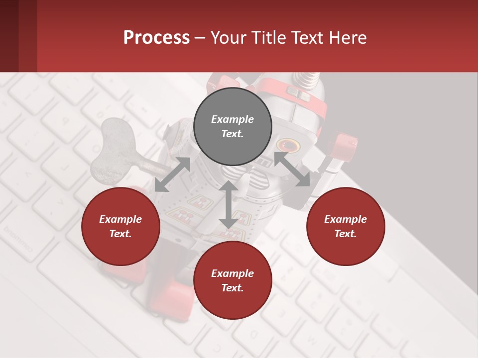 A Robot Keychain Sitting On Top Of A Keyboard PowerPoint Template