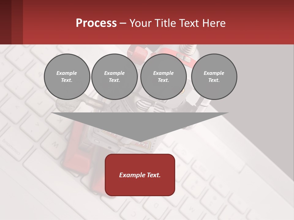 A Robot Keychain Sitting On Top Of A Keyboard PowerPoint Template