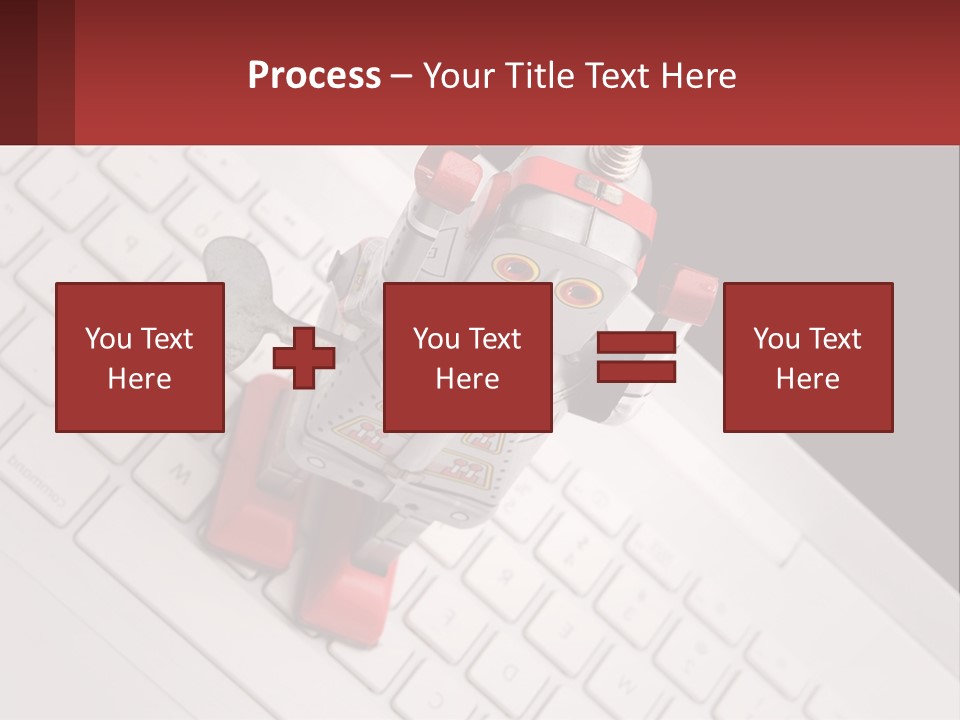 A Robot Keychain Sitting On Top Of A Keyboard PowerPoint Template
