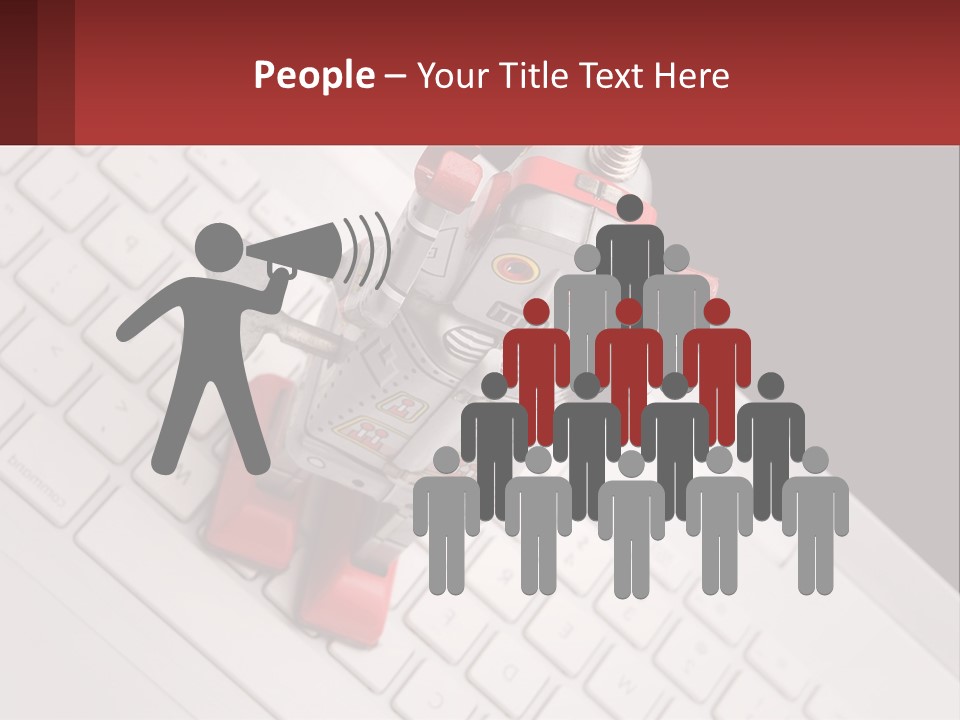 A Robot Keychain Sitting On Top Of A Keyboard PowerPoint Template