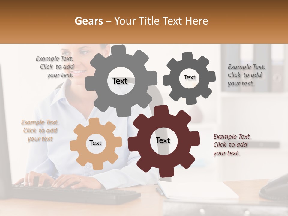 A Woman Sitting At A Desk In Front Of A Computer PowerPoint Template