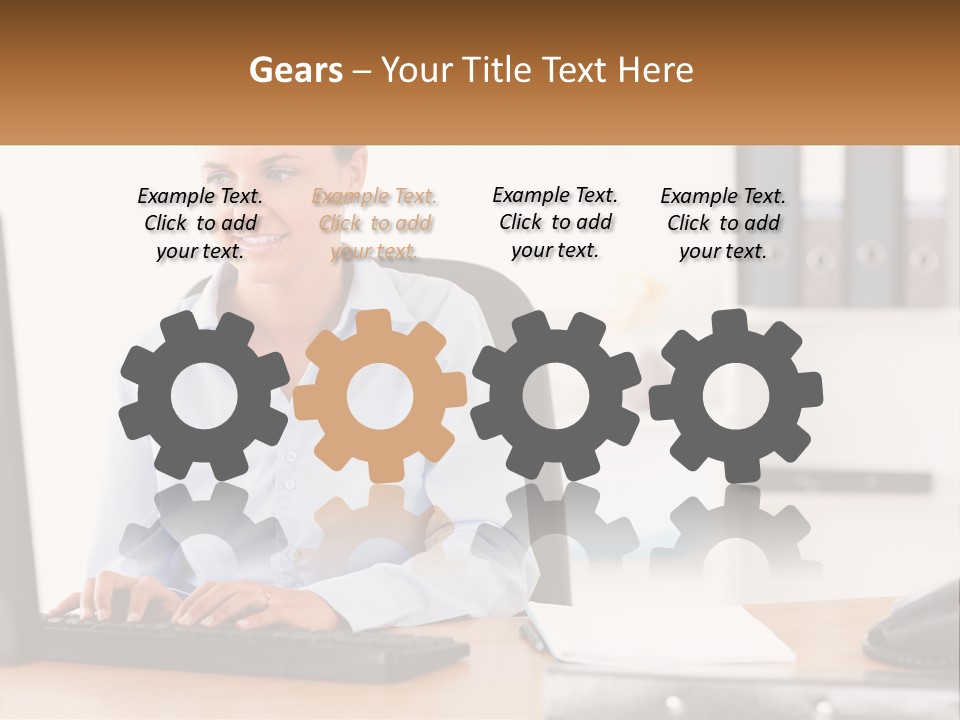 A Woman Sitting At A Desk In Front Of A Computer PowerPoint Template