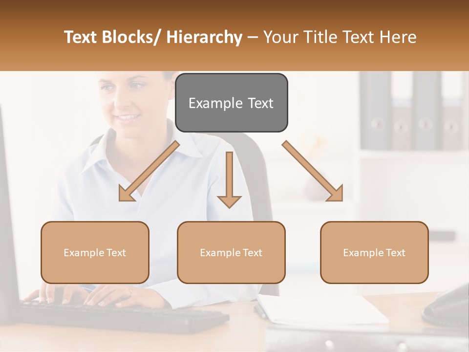 A Woman Sitting At A Desk In Front Of A Computer PowerPoint Template