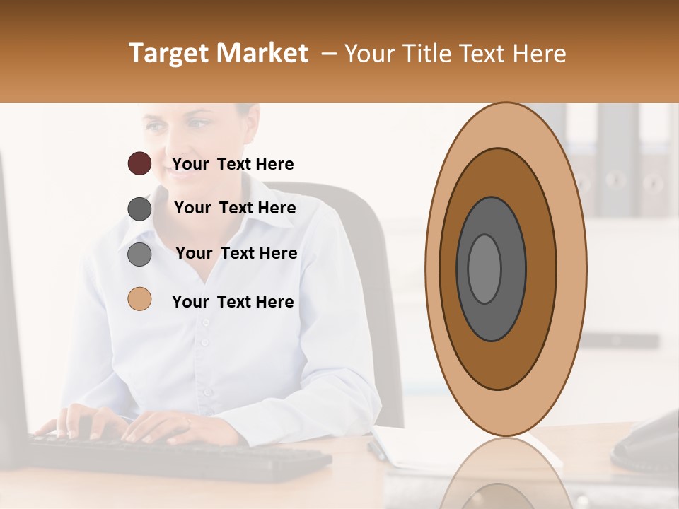 A Woman Sitting At A Desk In Front Of A Computer PowerPoint Template