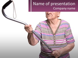 An Old Woman Holding A Metal Object In Her Hand PowerPoint Template