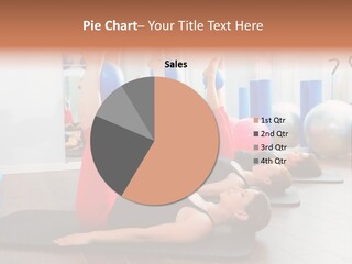 A Group Of Women Doing Yoga Exercises In A Gym PowerPoint Template