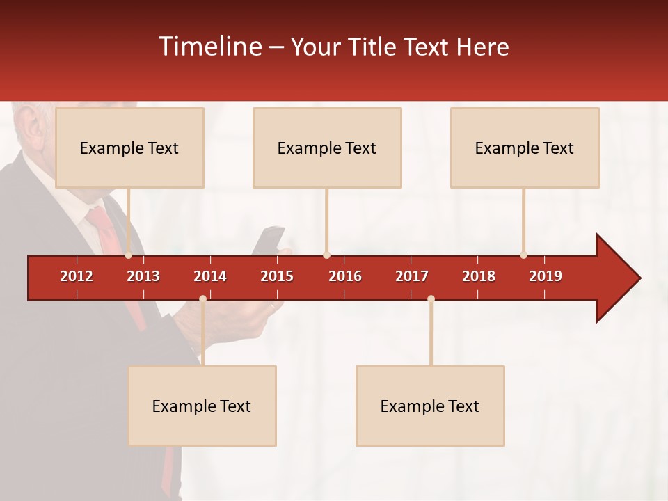 A Man In A Suit Holding A Cell Phone PowerPoint Template