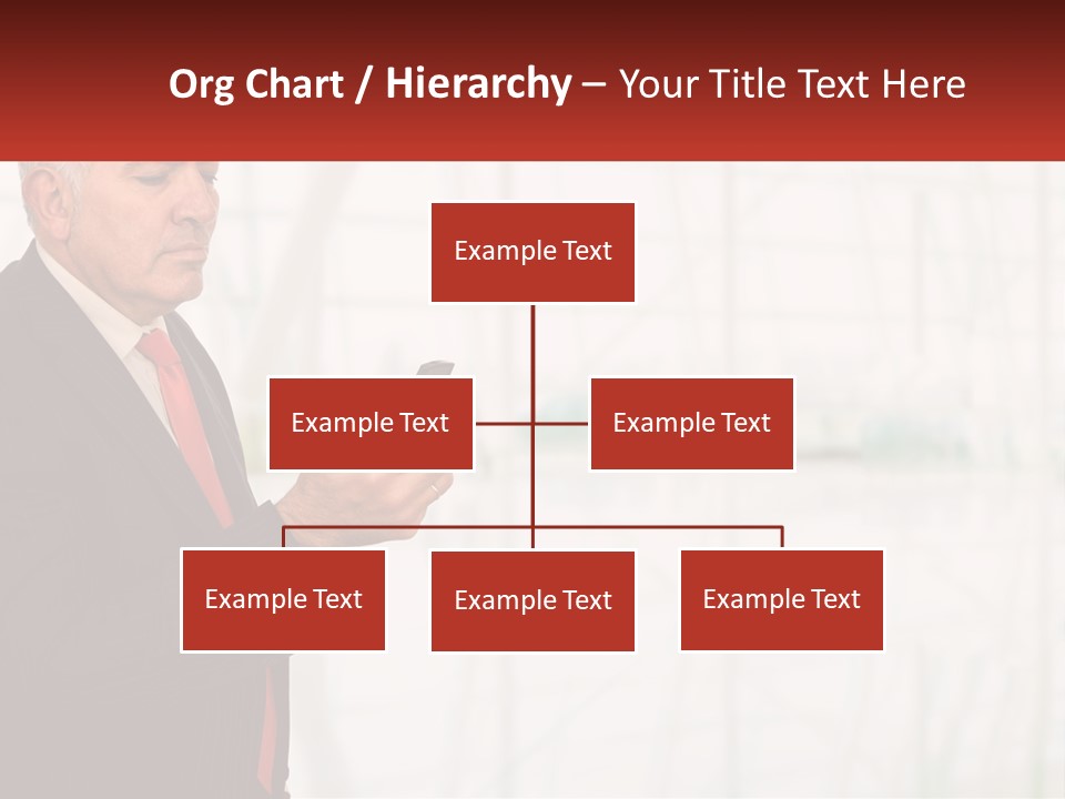 A Man In A Suit Holding A Cell Phone PowerPoint Template