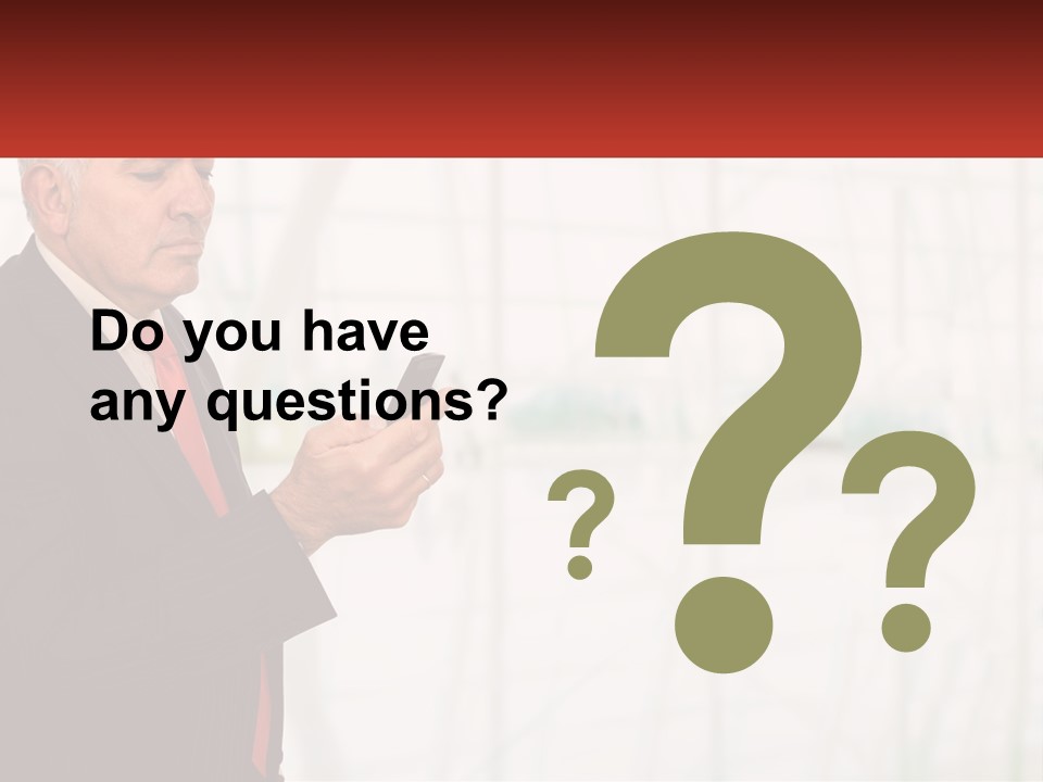 A Man In A Suit Holding A Cell Phone PowerPoint Template