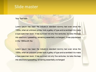 A Bowl Of Salad With An Avocado Next To A Fork PowerPoint Template