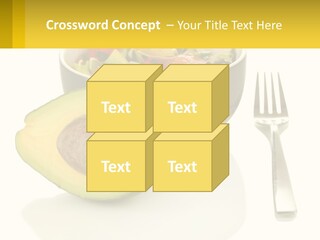 A Bowl Of Salad With An Avocado Next To A Fork PowerPoint Template