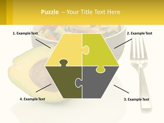 A Bowl Of Salad With An Avocado Next To A Fork PowerPoint Template