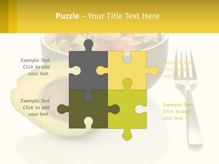 A Bowl Of Salad With An Avocado Next To A Fork PowerPoint Template