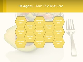 A Bowl Of Salad With An Avocado Next To A Fork PowerPoint Template