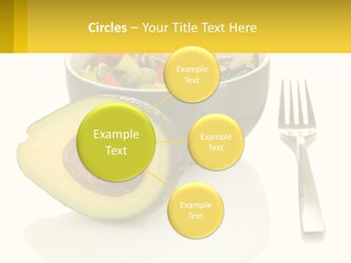 A Bowl Of Salad With An Avocado Next To A Fork PowerPoint Template