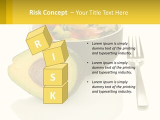 A Bowl Of Salad With An Avocado Next To A Fork PowerPoint Template