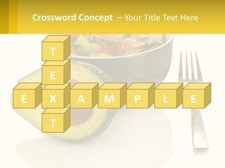 A Bowl Of Salad With An Avocado Next To A Fork PowerPoint Template