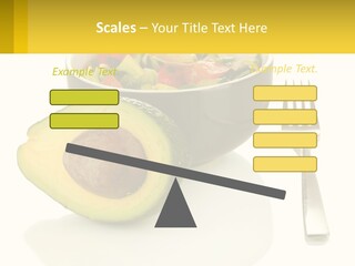 A Bowl Of Salad With An Avocado Next To A Fork PowerPoint Template