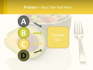 A Bowl Of Salad With An Avocado Next To A Fork PowerPoint Template