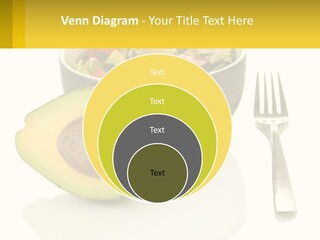 A Bowl Of Salad With An Avocado Next To A Fork PowerPoint Template