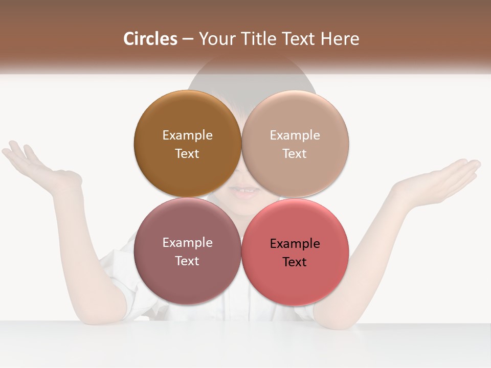 A Young Boy Sitting At A Table With His Hands Out PowerPoint Template