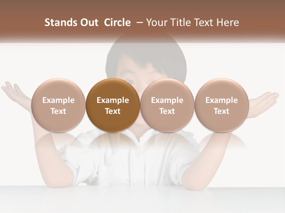 A Young Boy Sitting At A Table With His Hands Out PowerPoint Template