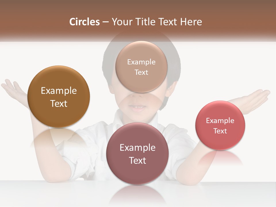 A Young Boy Sitting At A Table With His Hands Out PowerPoint Template