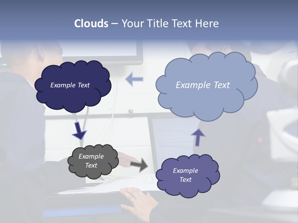 A Couple Of Men Sitting In Front Of A Laptop Computer PowerPoint Template