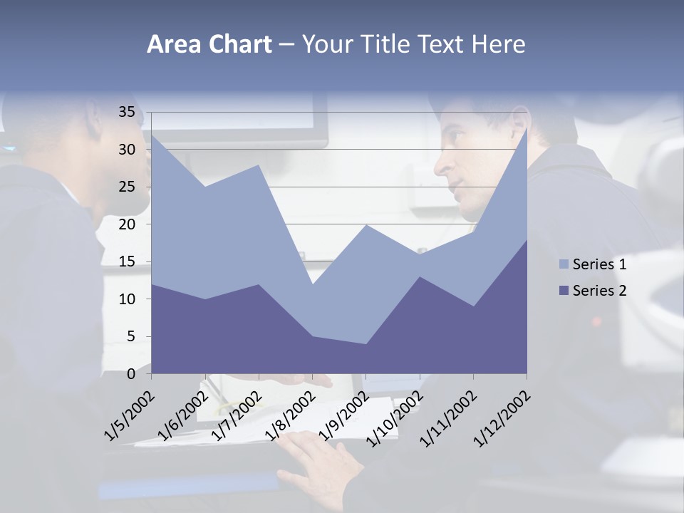 A Couple Of Men Sitting In Front Of A Laptop Computer PowerPoint Template
