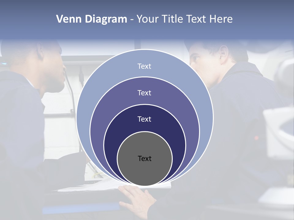 A Couple Of Men Sitting In Front Of A Laptop Computer PowerPoint Template