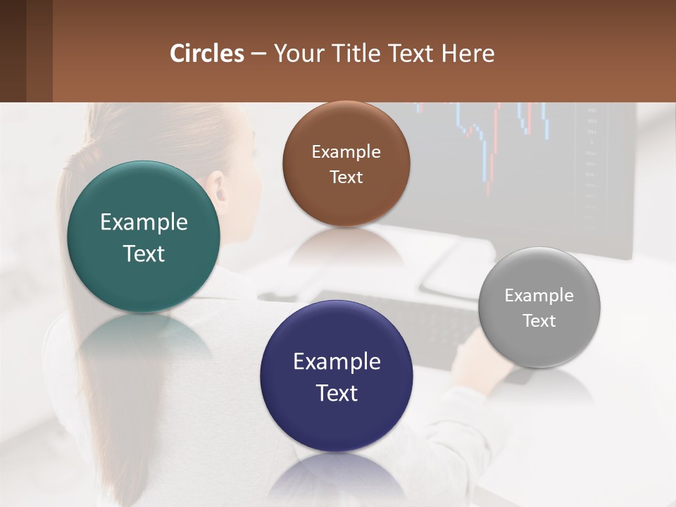 A Woman Sitting At A Desk With A Computer PowerPoint Template